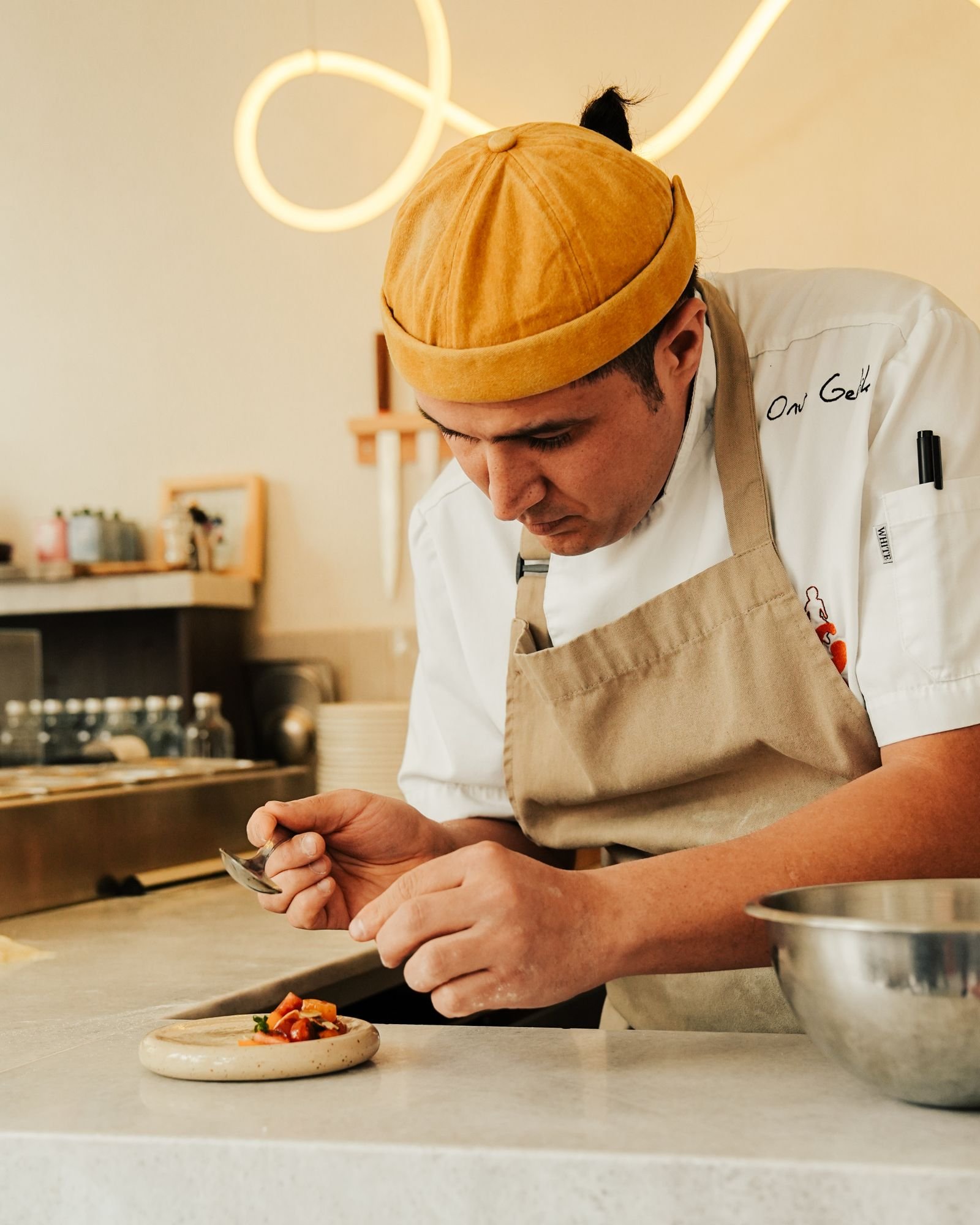 Chef plating a dish